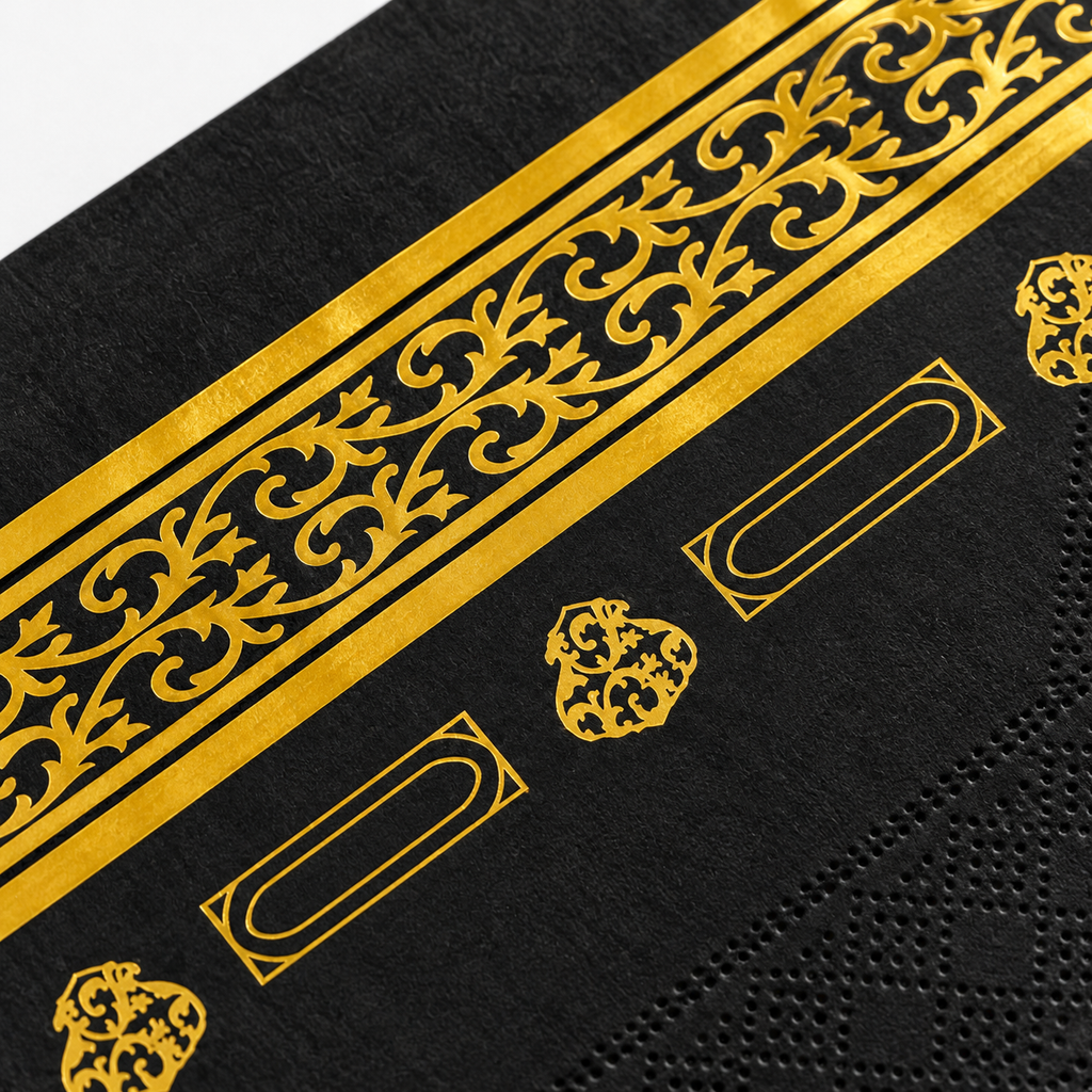 Detail goudfolie en papierstructuur van Hadj en Umrah servetten